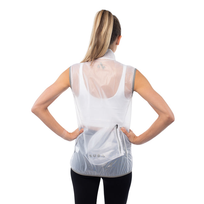 Woman wearing a white outdoor jacket on a white background
