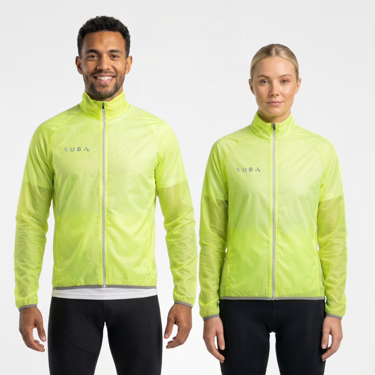 Man and woman wearing fluro-yellow translucent rain jacket