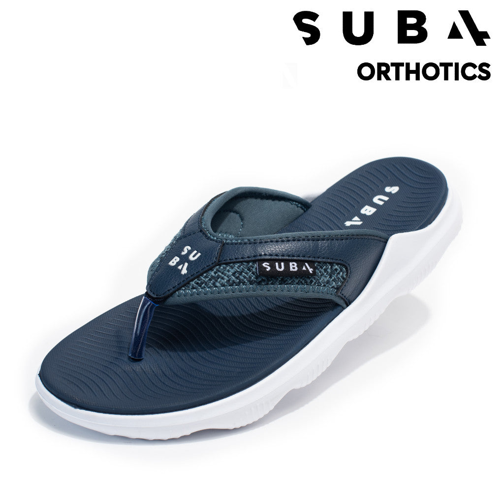 Navy sandal with white sole on a white background, featuring the Sub4 Orthotics logo.