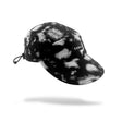 A black and grey running cap with a small white 'SUB4' logo patch on the side, shown floating against a white background with a soft shadow underneath.