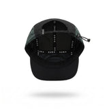 A black and coal teal running cap with a small white 'SUB4' logo patch on the side, shown floating against a white background with a soft shadow underneath.