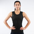 Woman wearing a black sleeveless top with a brand logo on a white background