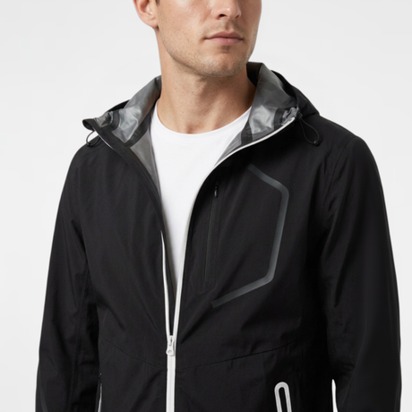 Man wearing a black waterproof jacket with a white background