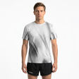 Person wearing a light grey running t-shirt with black patterns and black running shorts on a white background