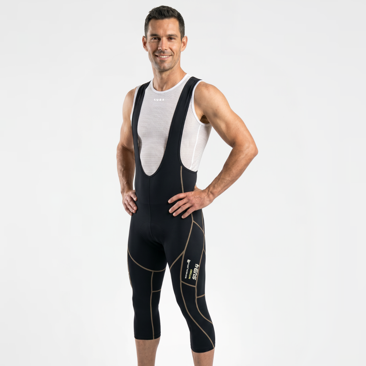 Man wearing a classic black cycling bib shorts on a white background