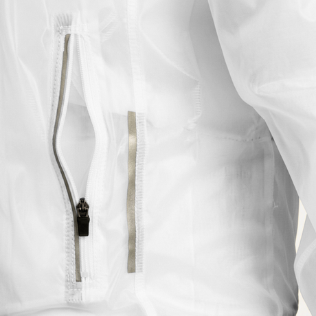 Close-up of a clear rain jacket with a zipper and reflective trims