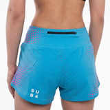 Blue athletic shorts with pink geometric design and 'SUB4' branding on a white background  