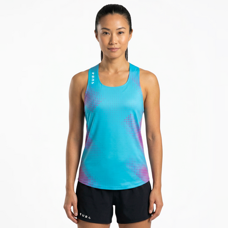 Woman wearing a blue athletic tank top with a geometric pattern on a white background