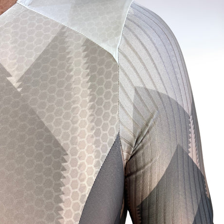 Close-up of a textured fabric with geometric patterns on a white background