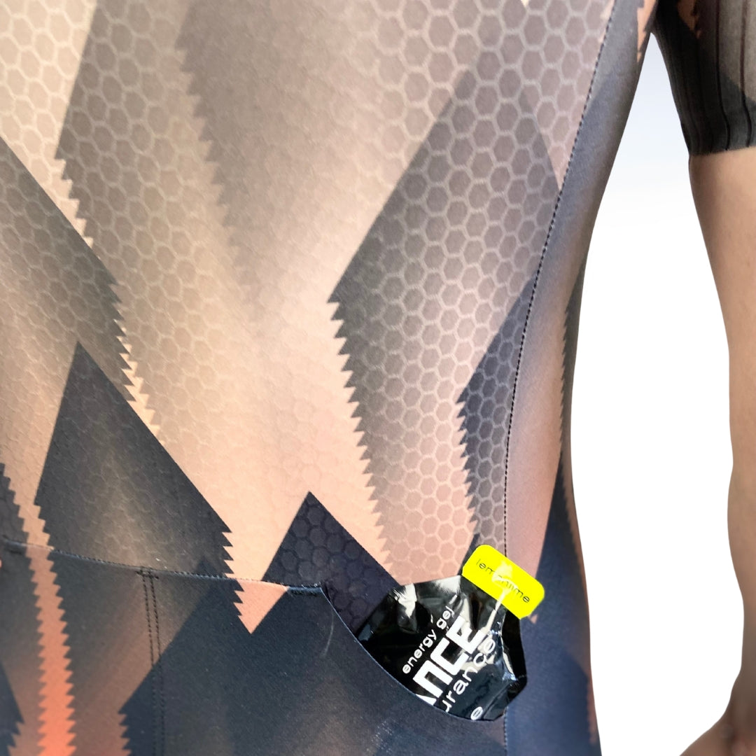 Close-up of a person wearing a textured garment with a visible brand label.