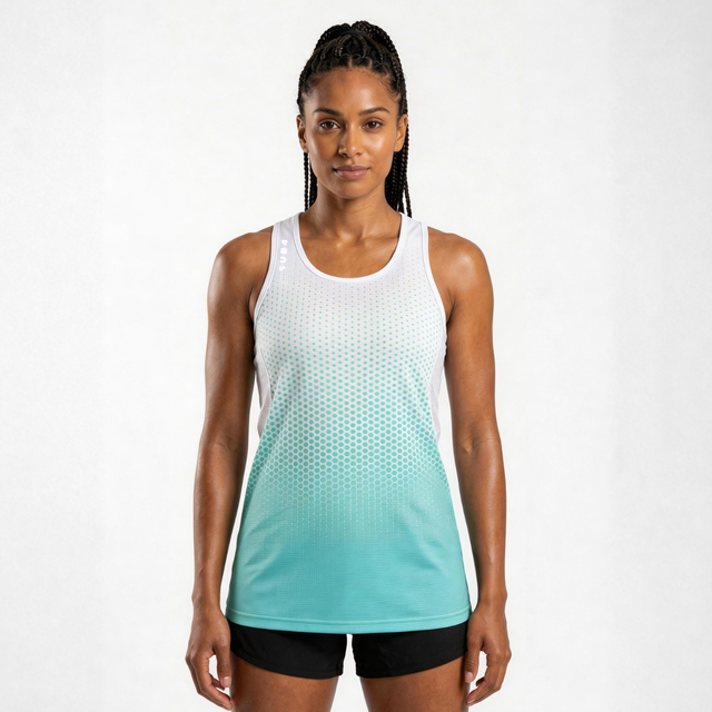 Woman wearing a white and blue dot geometric gradient tank top on a white background