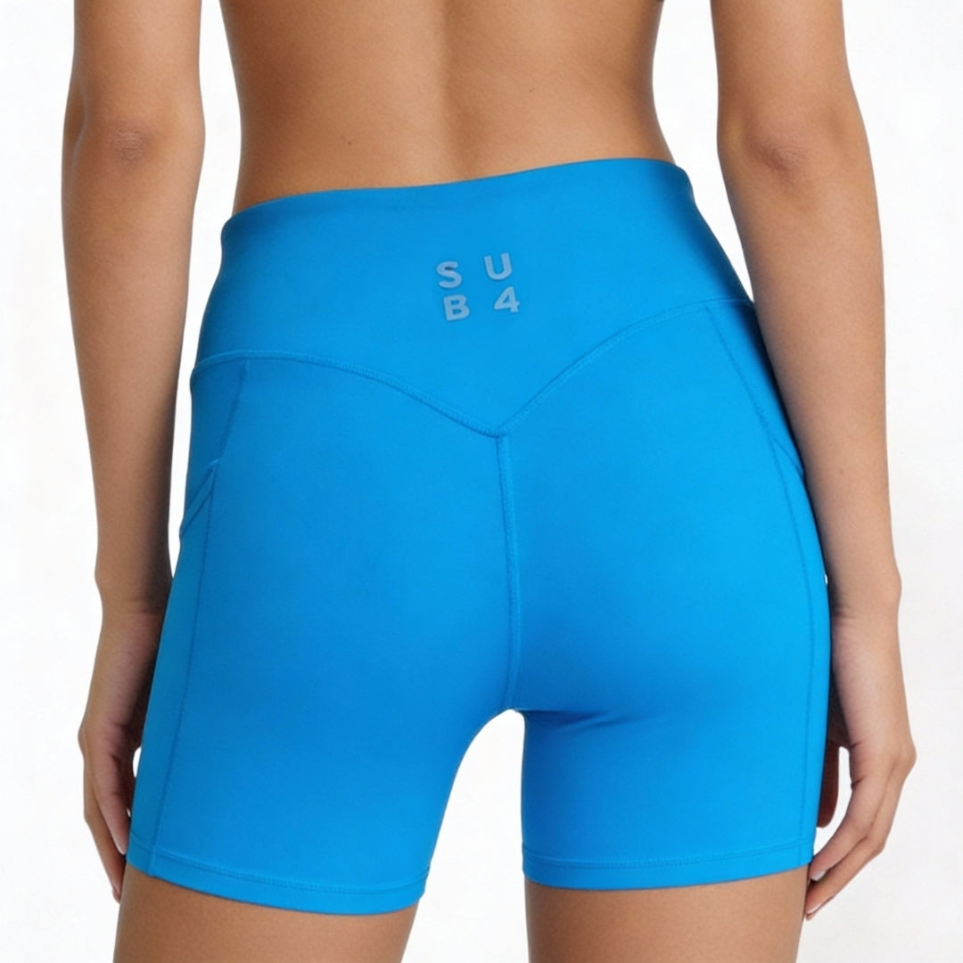 Blue athletic shorts with 'SUB4' branding on a white background