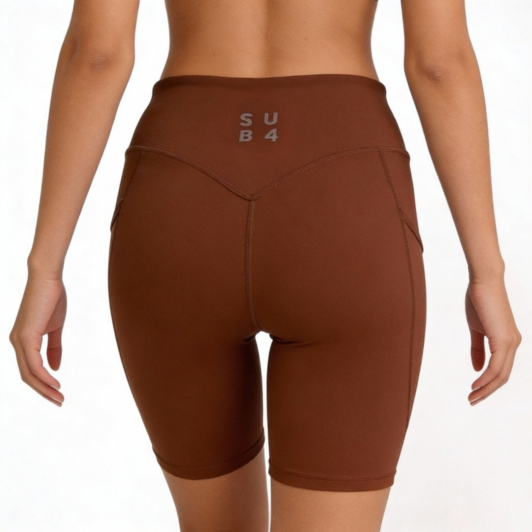 Mocha athletic shorts with 'SUB4' logo on a white background.
