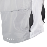 Close-up of a gray jacket with a visible brand logo on a white background